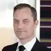 Dr Andrew Schuster